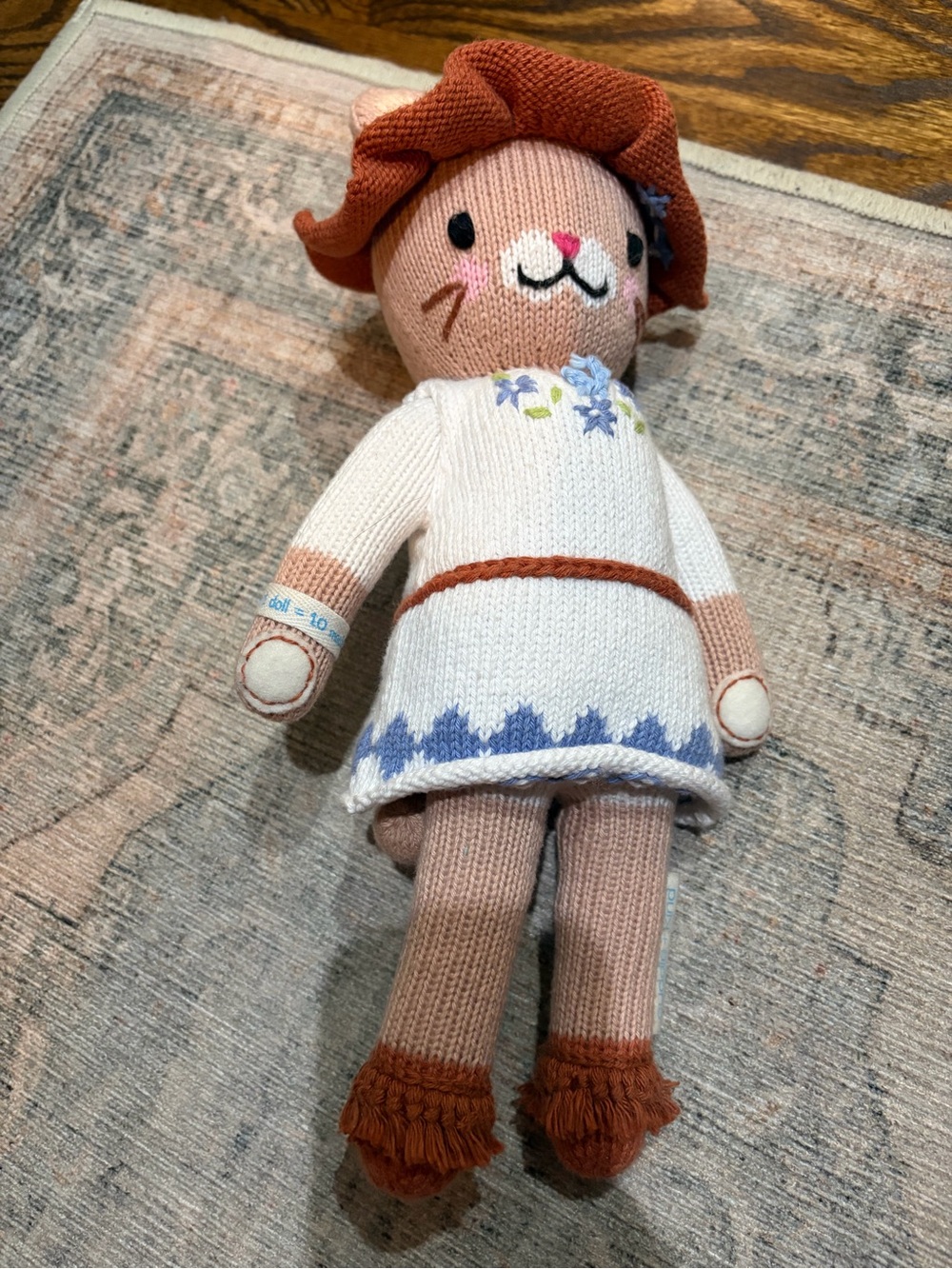Cuddle + Kind Hand-Knit Pink Cat Doll in White Dress with Blue Trim